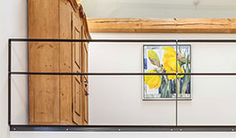 Wohnung 1 - Podestaufbau, in dem ein Stauraum und ein Alkoven ( Bettnische ) integriert worden sind - Tina Assmann - Innenarchitektur - München